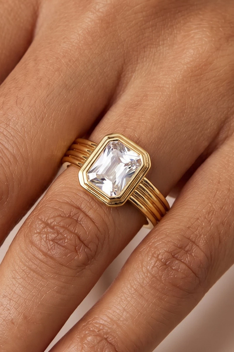 Triple Ridge Band Emerald Cut Bezel Cz Ring