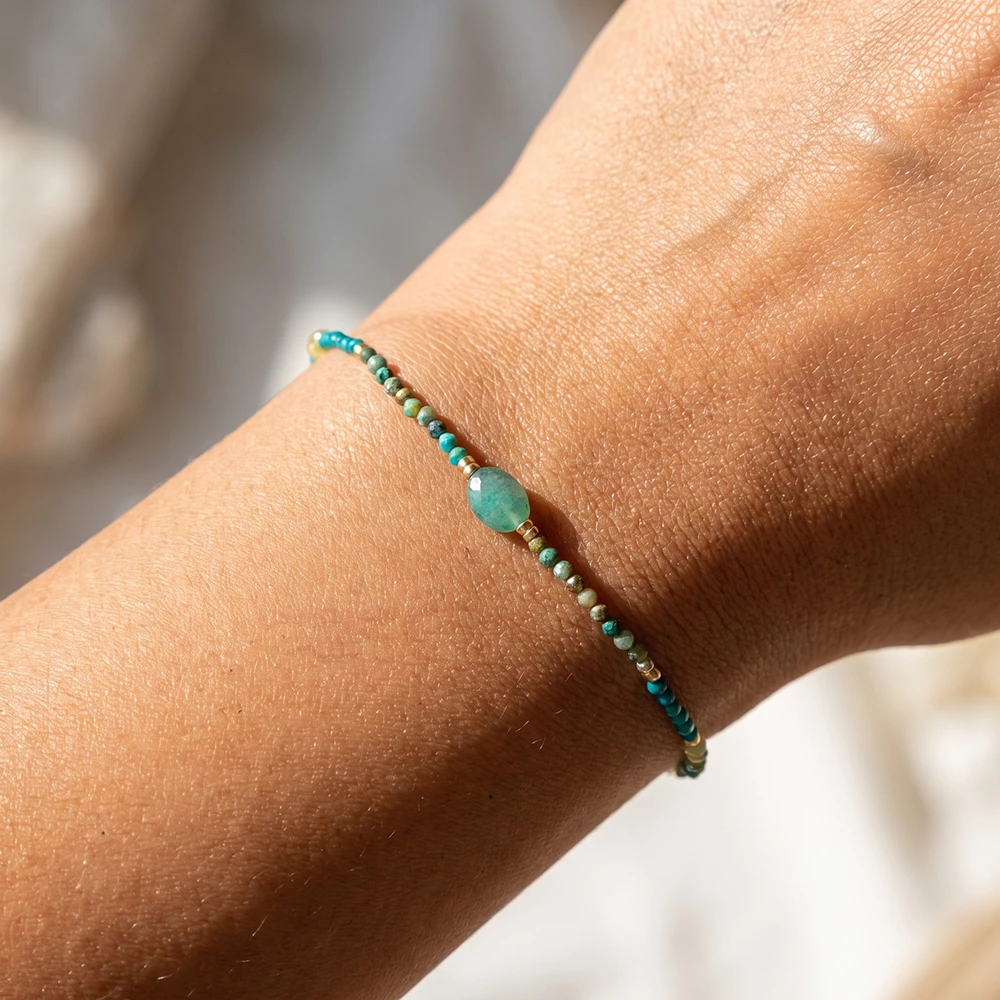 Faceted Bead Stretch Bracelet With Oval Stone