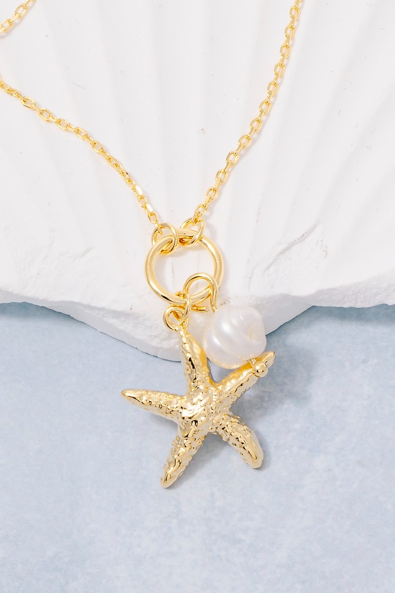 Gold Dipped Textured Starfish And Pearl Pendant Necklace