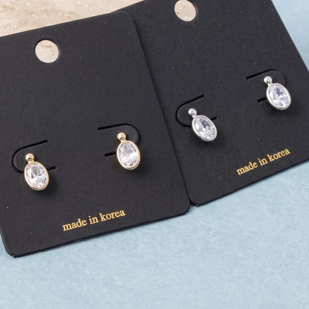 Oval Cz Bezel Stud Earrings With Ball Top
