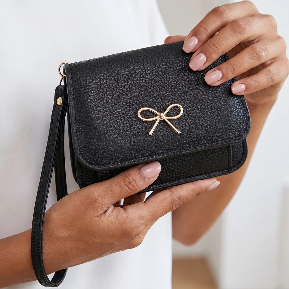 Bow Charm Vegan Leather Flap Wristlet