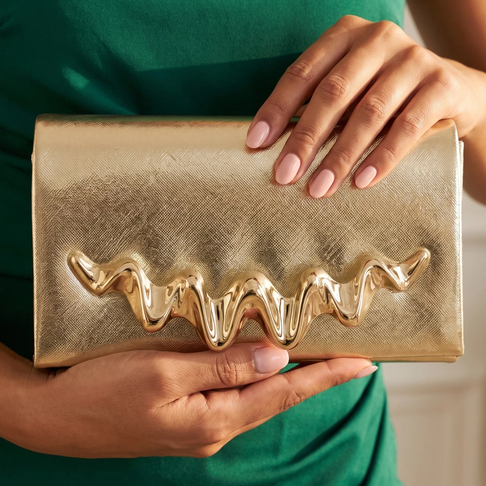 Metallic Clutch With Sculpted Wave Bar Accent
