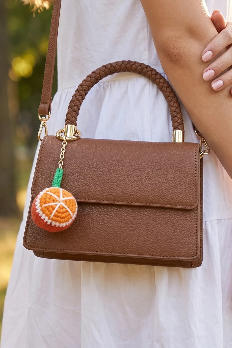 Braided Handle Orange Charm Mini Bag