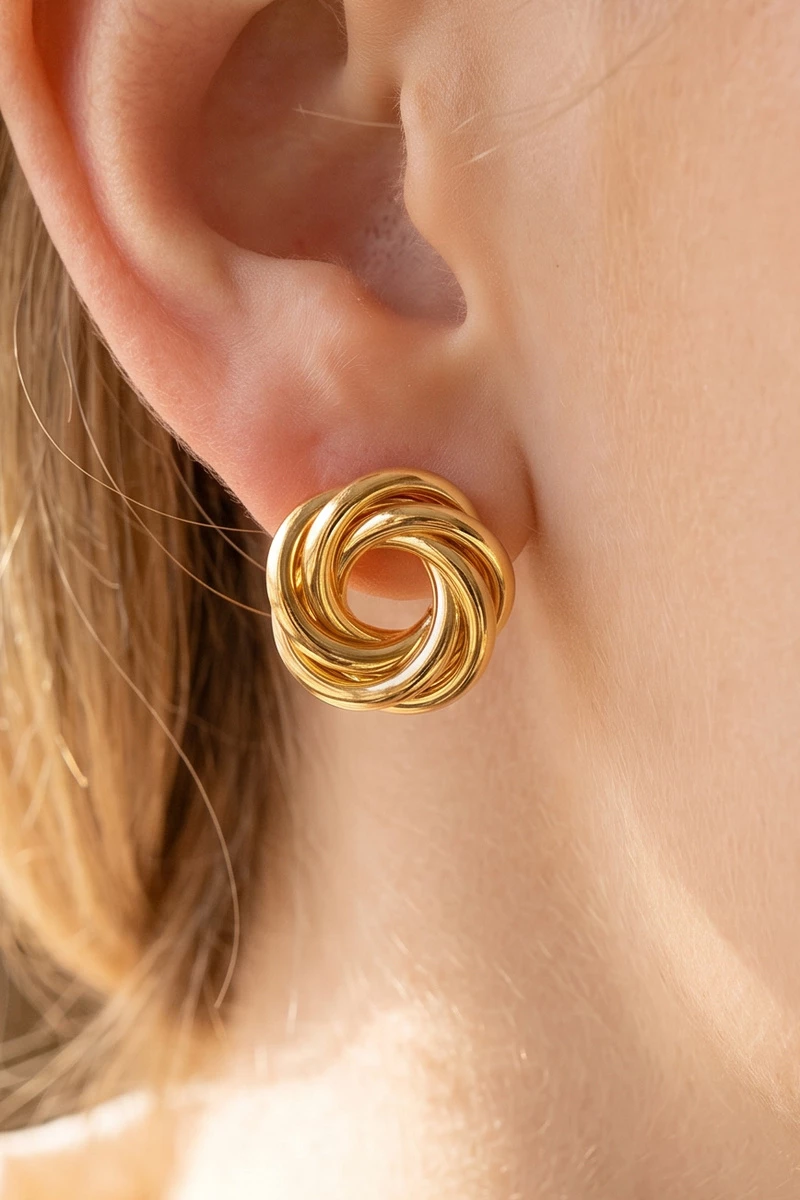 Gold Dipped Open Swirl Knot Statement Earrings