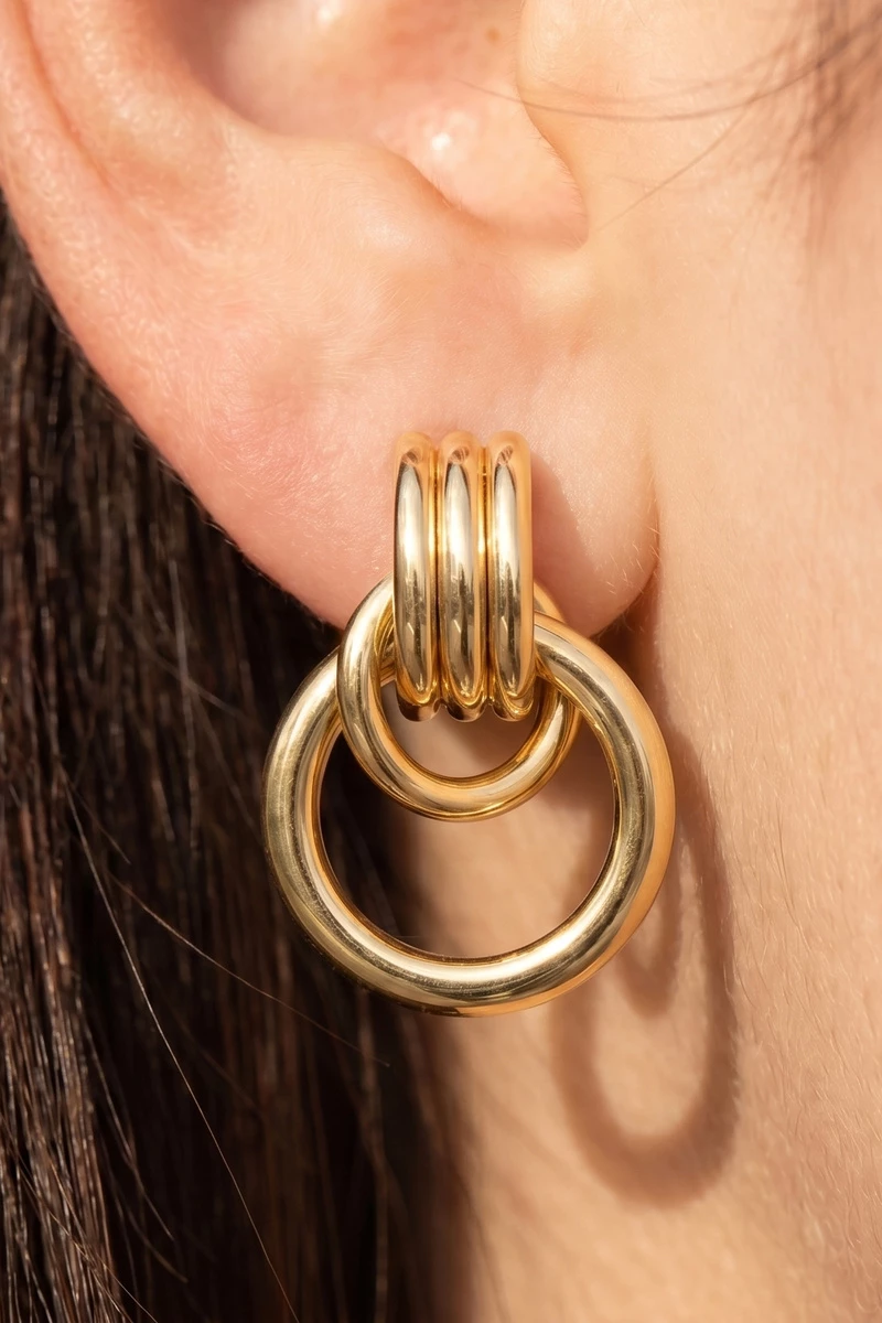 Gold Dipped Knot Circle Drop Doorknocker Earrings