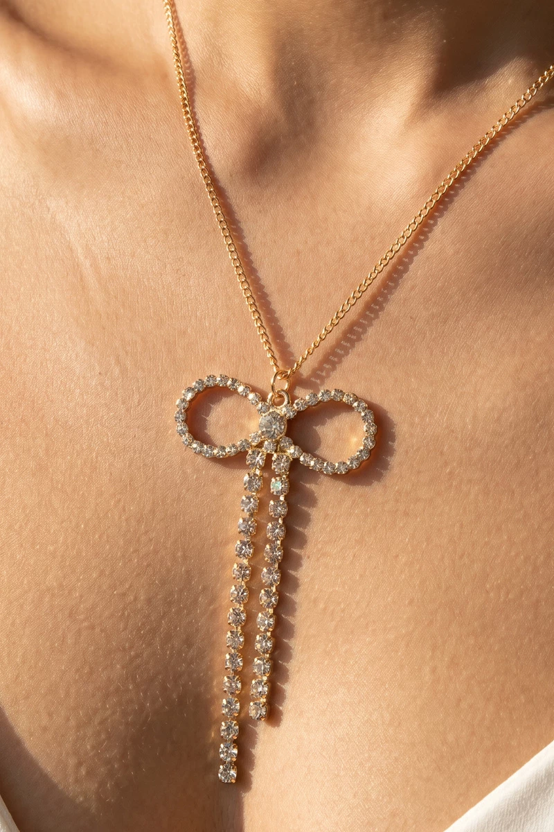 Rhinestone Bow Pendant Tassel Curb Chain Necklace