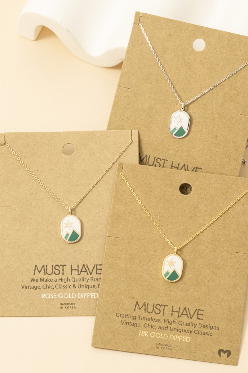 Gold Dipped Oval Mountain Range Coin Charm Necklace