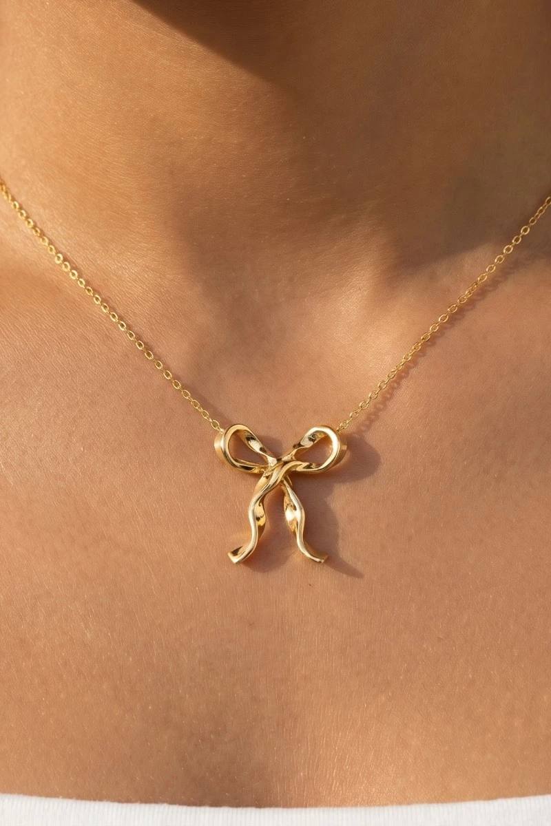 Gold Dipped Long Ribbon Bow Pendant Necklace