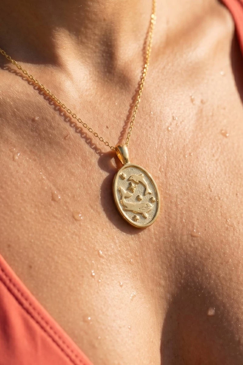 Gold Dipped Dolphin And Whale Oval Pendant Necklace