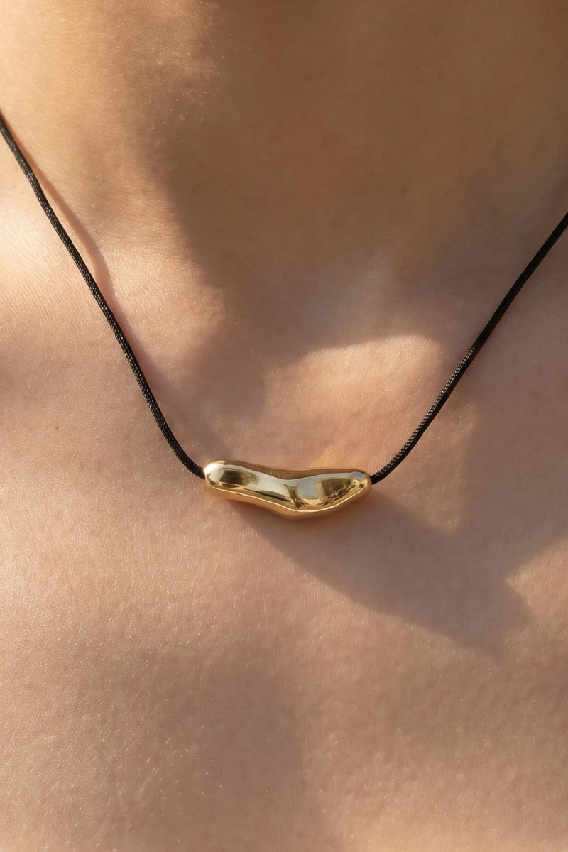 Abstract Molten Shape Pendant Cord Necklace