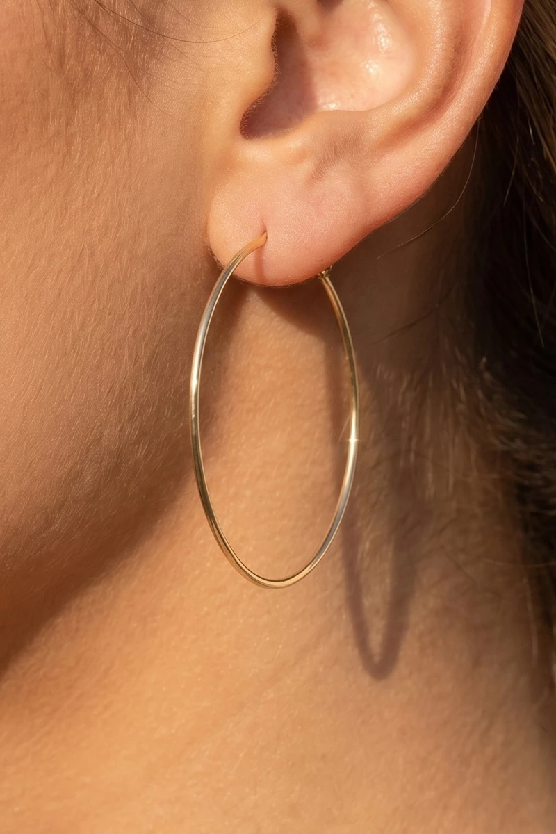 Secret Box Gold Dipped Oval Hoop Earrings